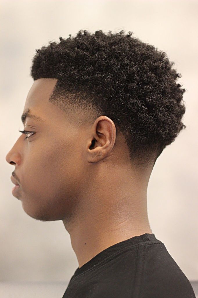 25 Taper Fade Haircuts For Black Men Fades For The Dark And Handsome Haircuts Hairstyles 2021 It boasts a cool taper fade around the individual's temples, hence creating a stylish look. haircuts hairstyles 2021