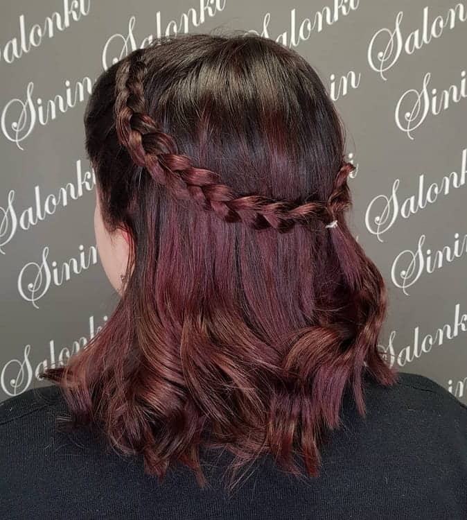 braided brown hair with red highlights